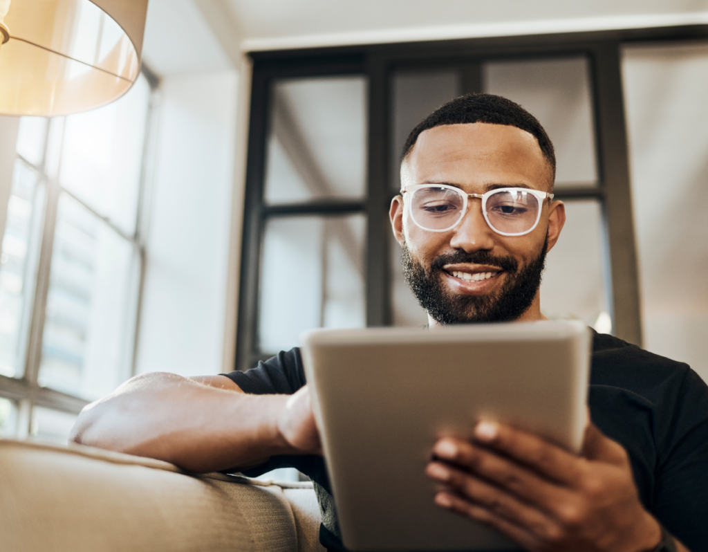 man holding a tablet